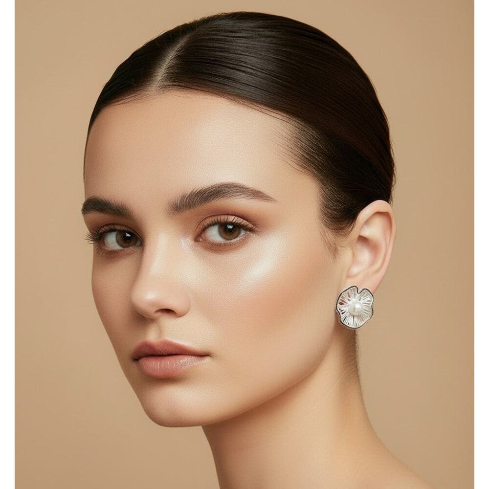 Clip on 3/4" silver and black bent wire flower earrings with pearl